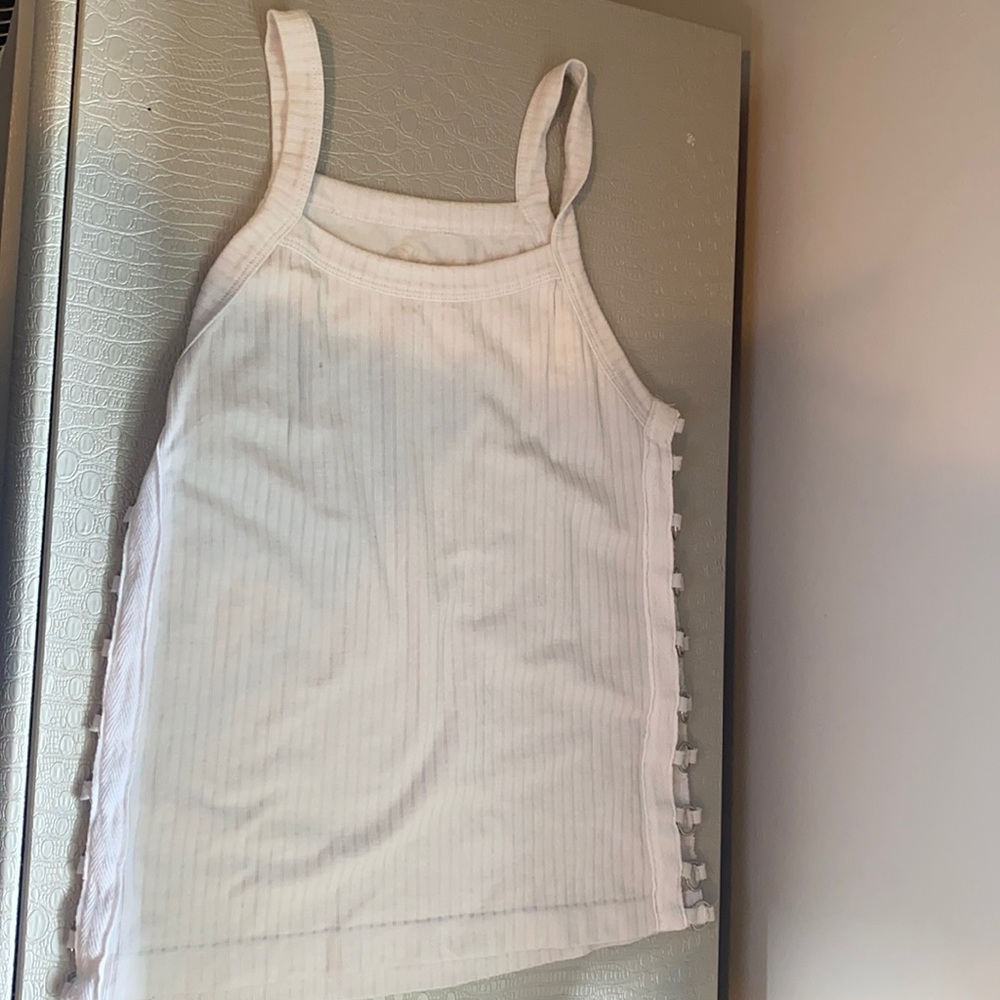 White tank top with rings along the side
